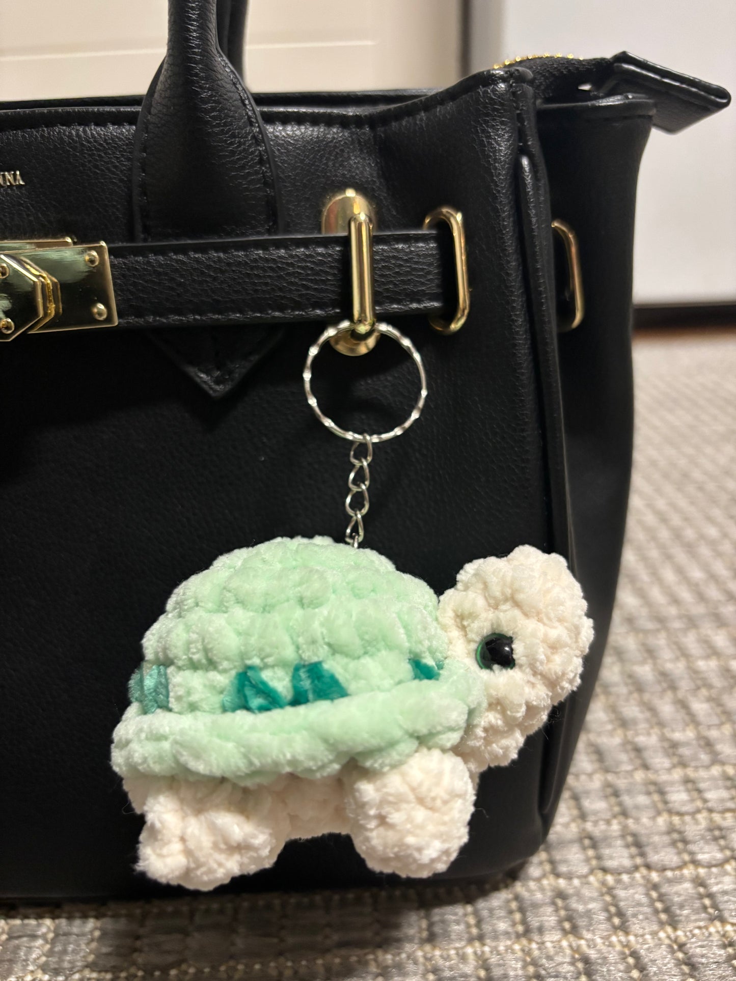 Kilpikonna avaimenperä (useita värejä)