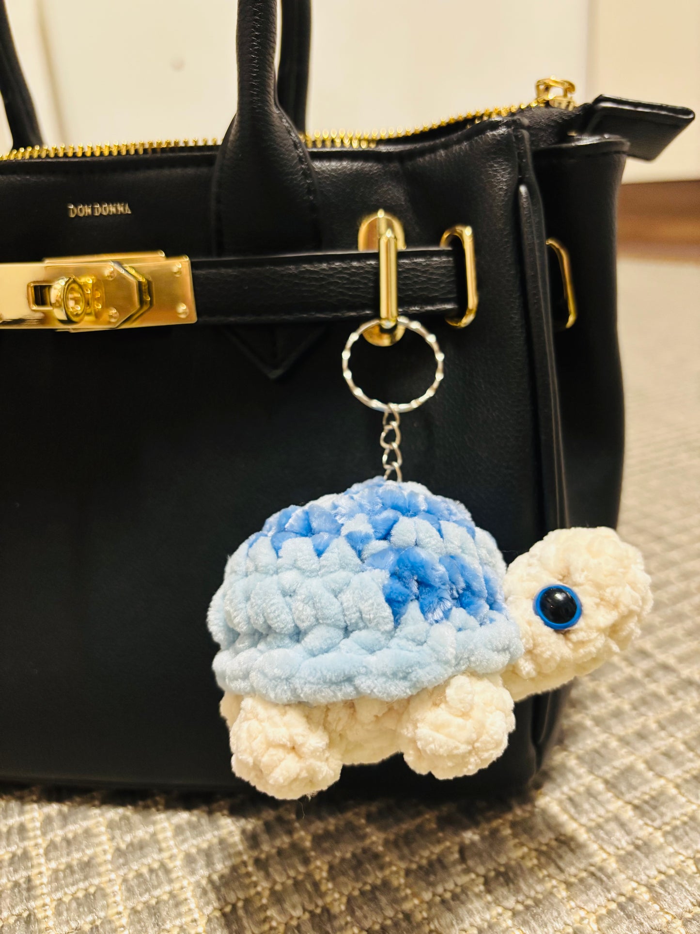 Kilpikonna avaimenperä (useita värejä)