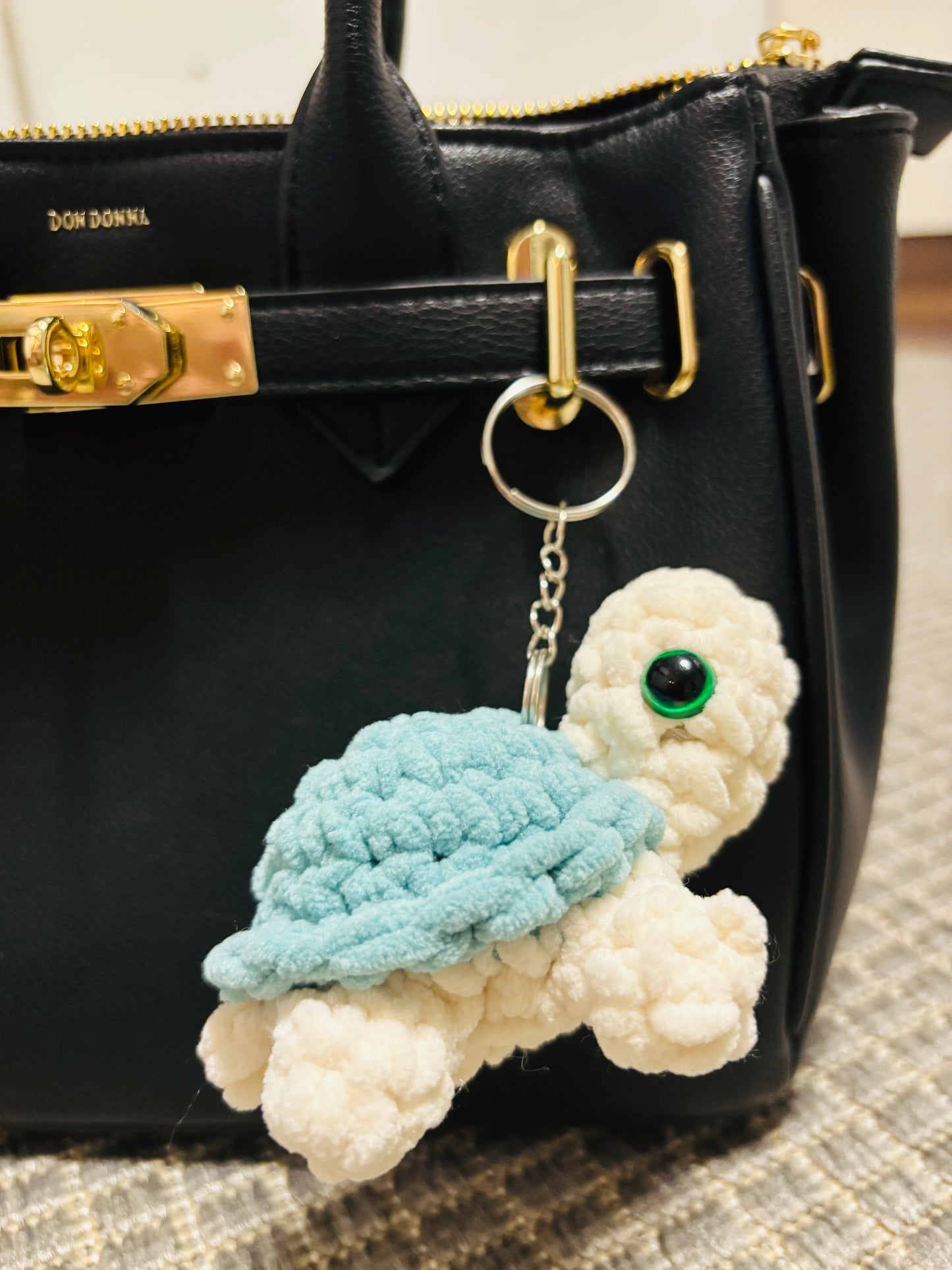 Kilpikonna avaimenperä (useita värejä)