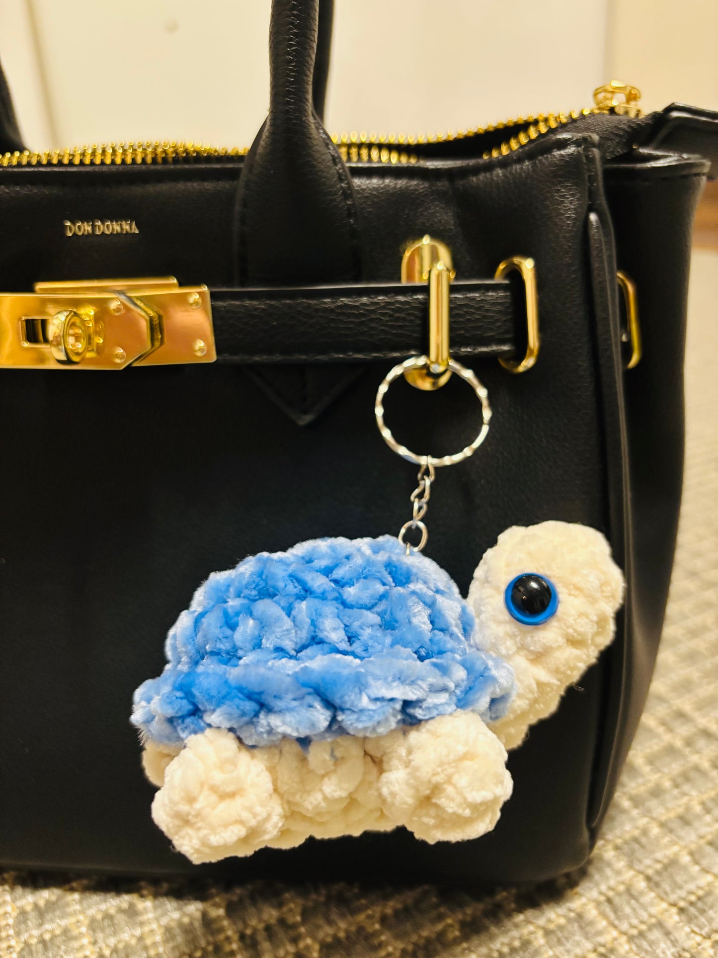 Kilpikonna avaimenperä (useita värejä)