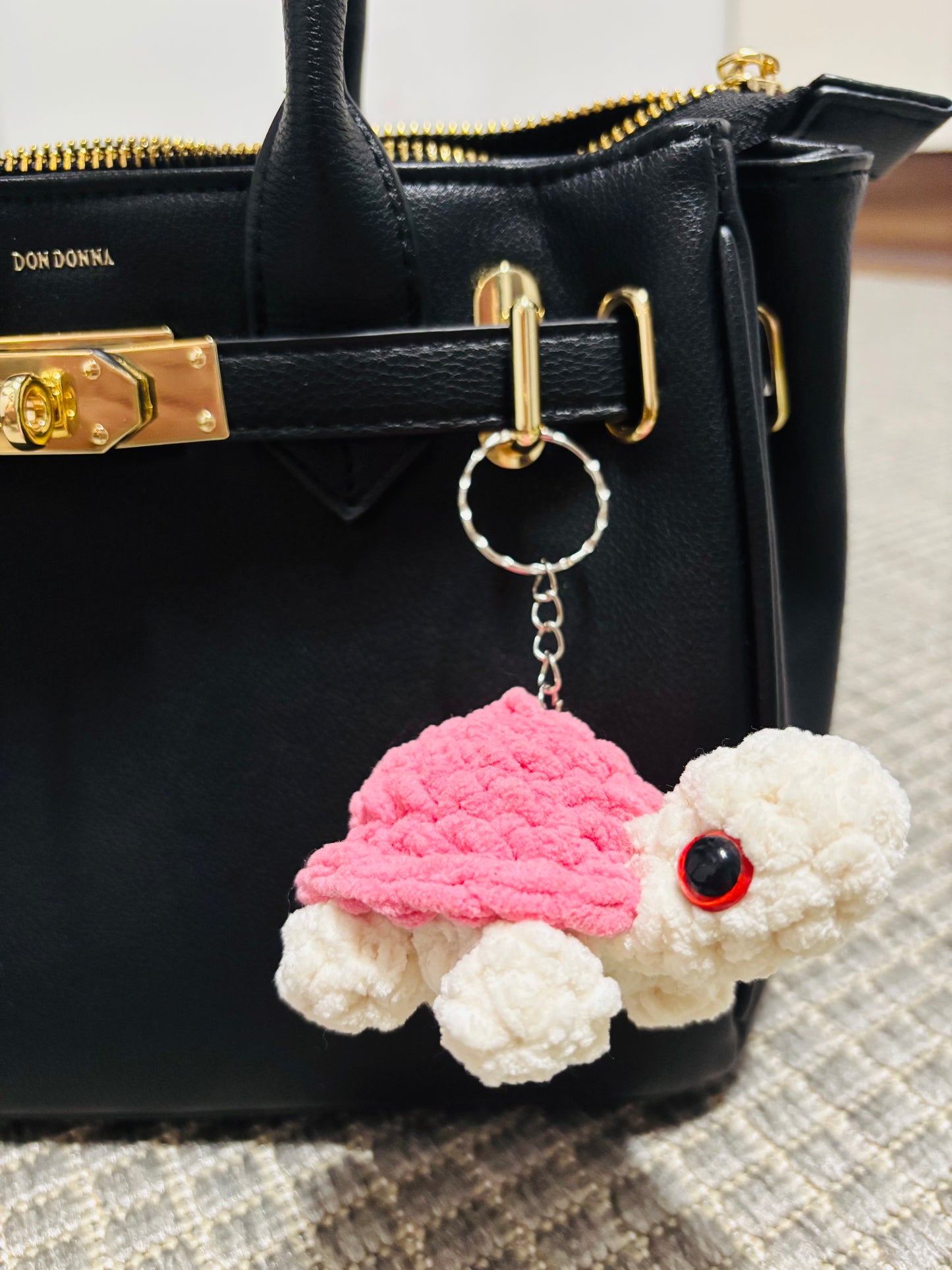 Kilpikonna avaimenperä (useita värejä)