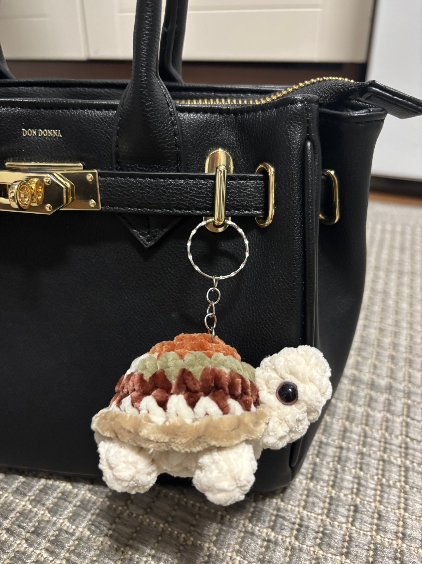 Kilpikonna avaimenperä (useita värejä)