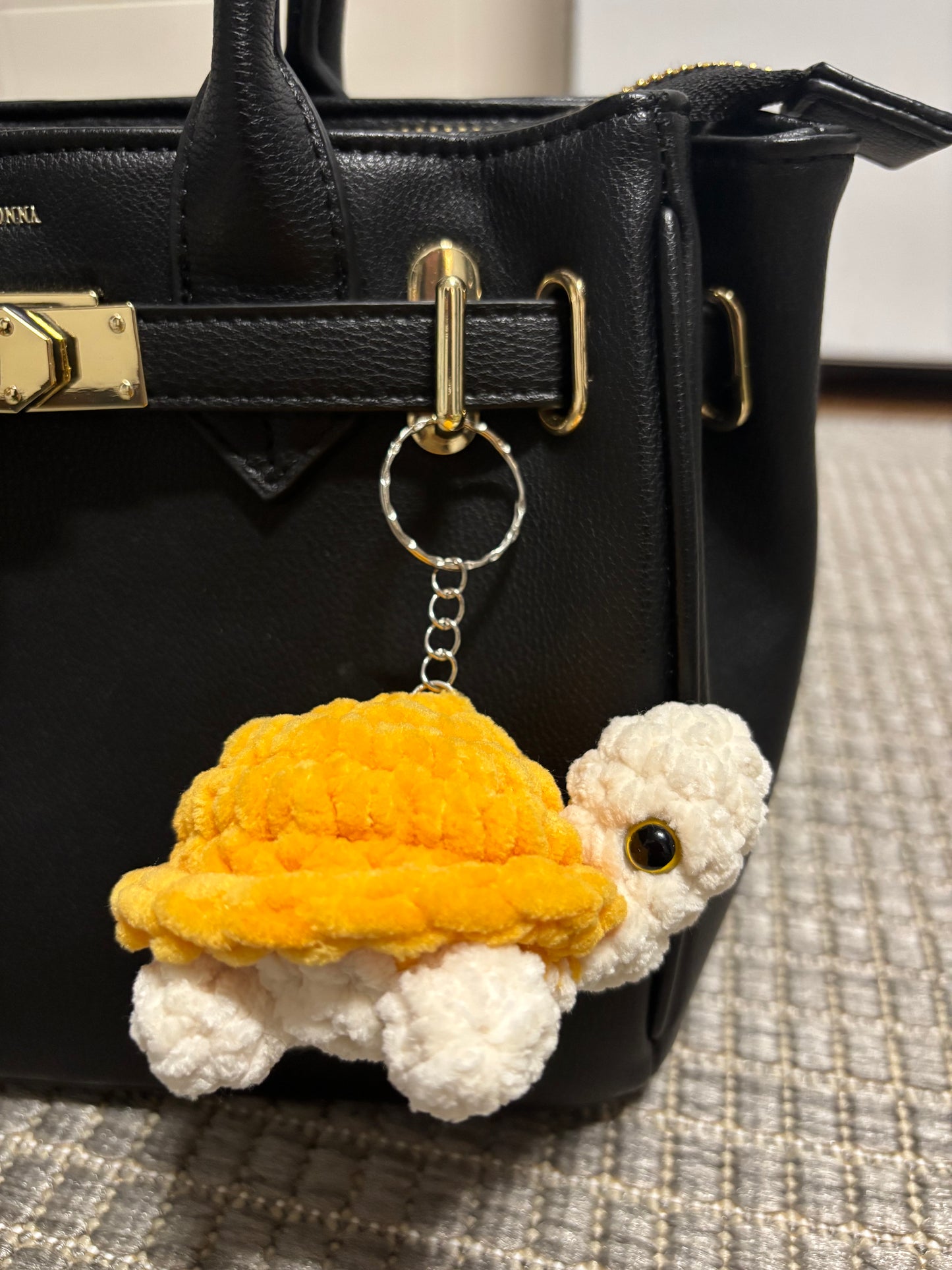 Kilpikonna avaimenperä (useita värejä)