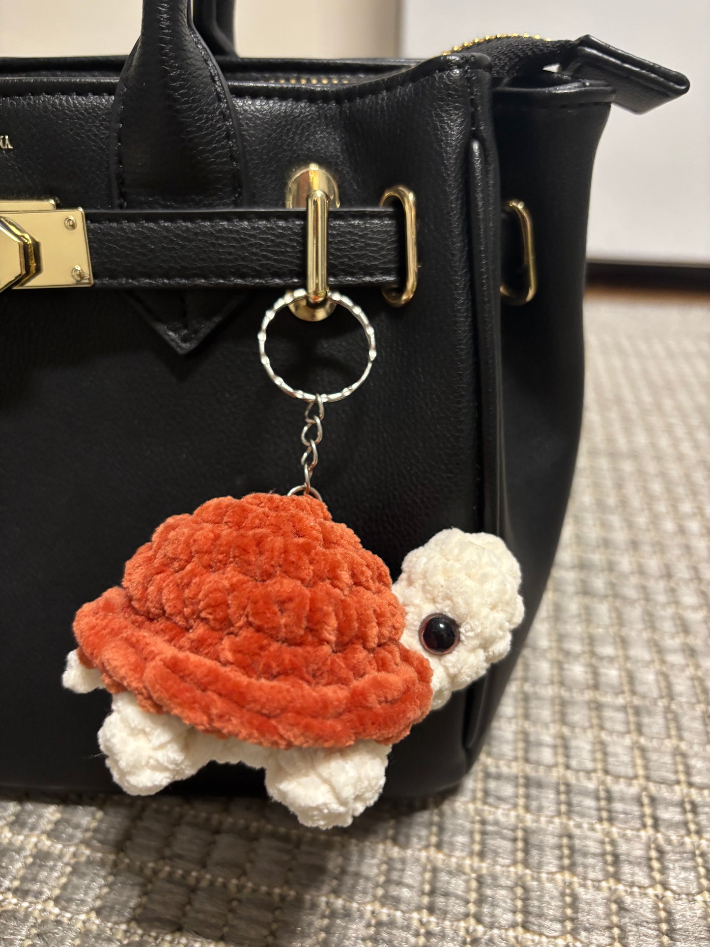 Kilpikonna avaimenperä (useita värejä)