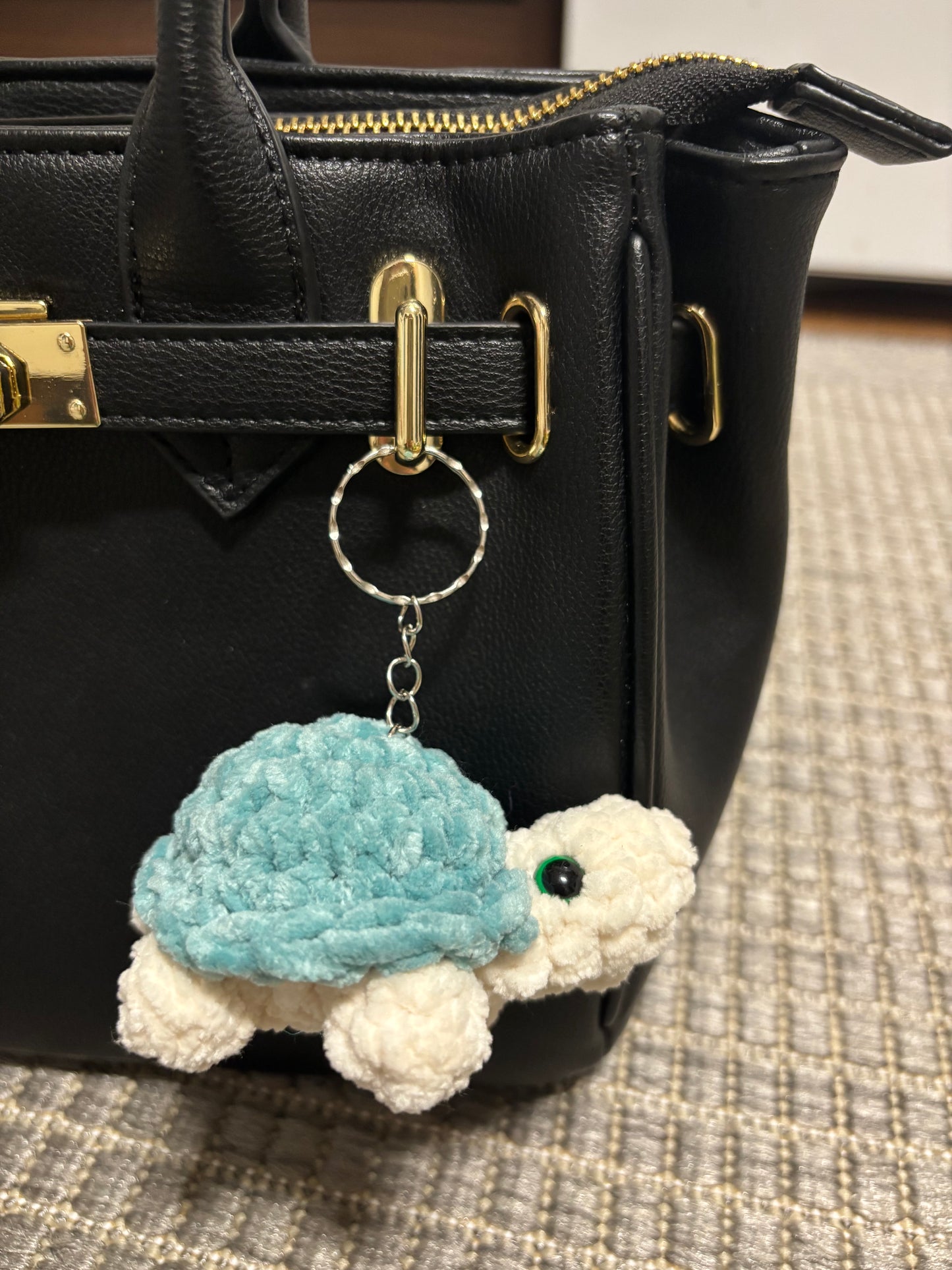 Kilpikonna avaimenperä (useita värejä)