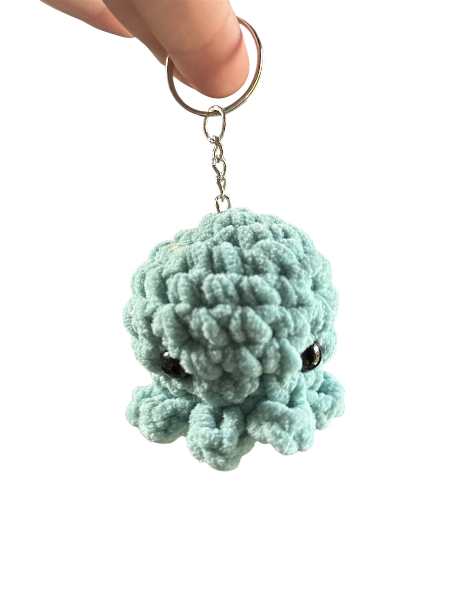 Mustekala laukkukoru/avaimenperä