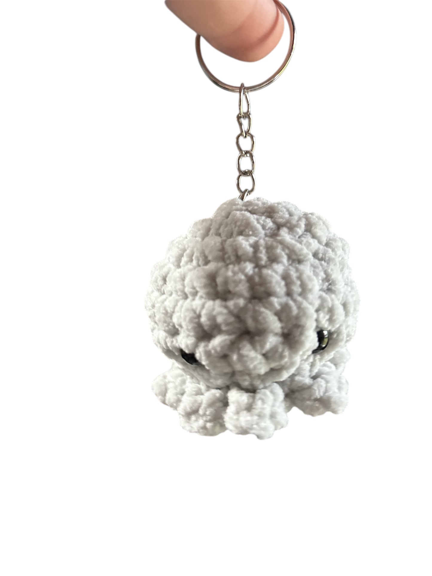 Mustekala laukkukoru/avaimenperä